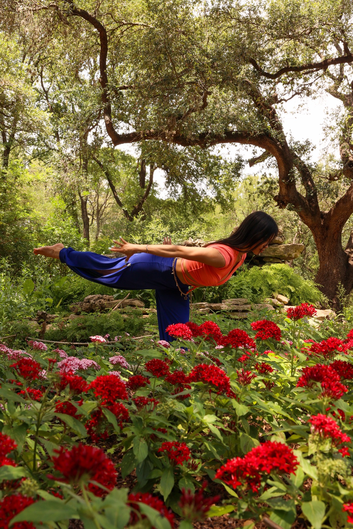 Malin in Warrior III pose
